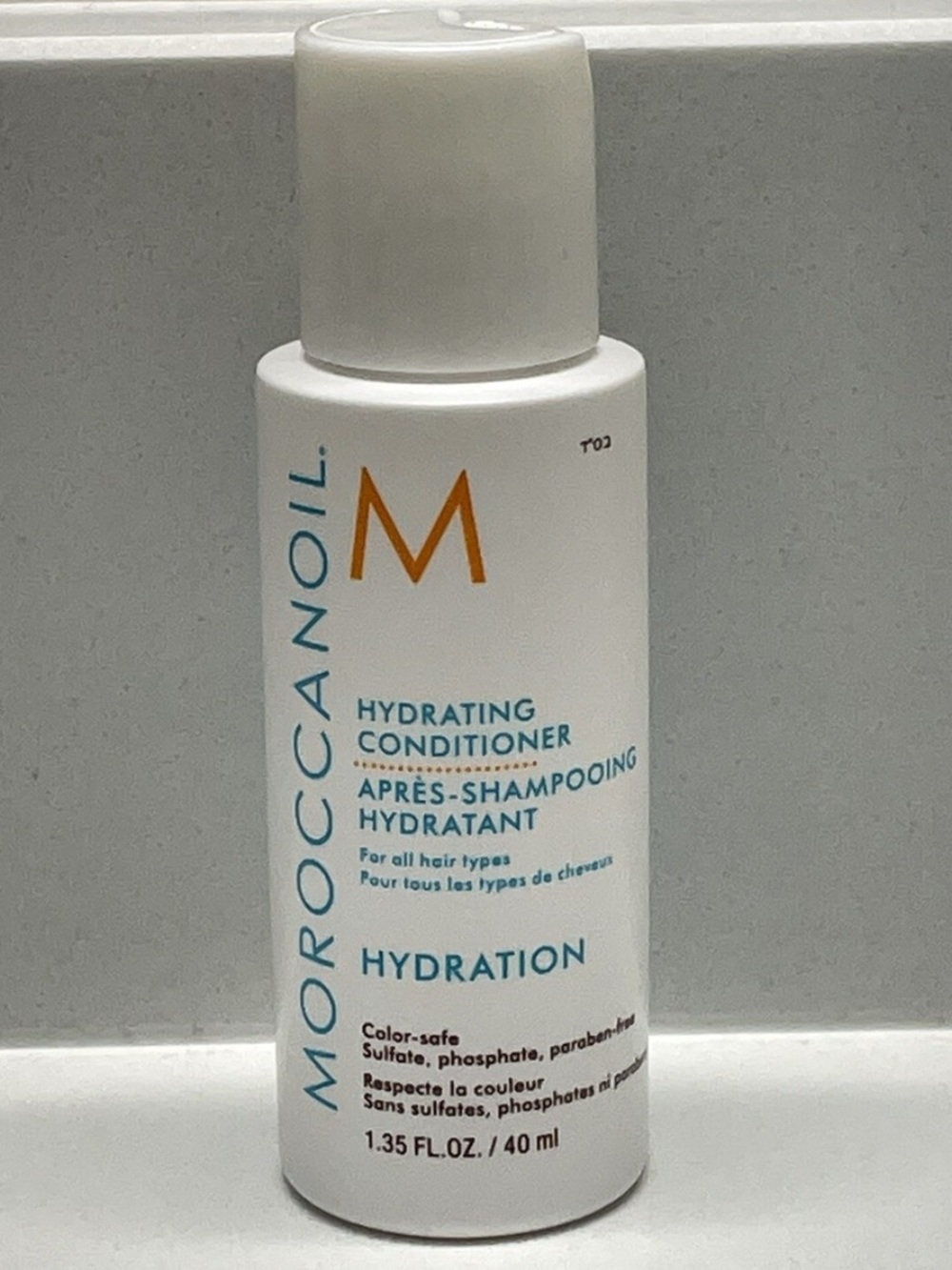 Moroccanoil Hydrating Conditioner 1.35oz - White with Teal & Orange Accents